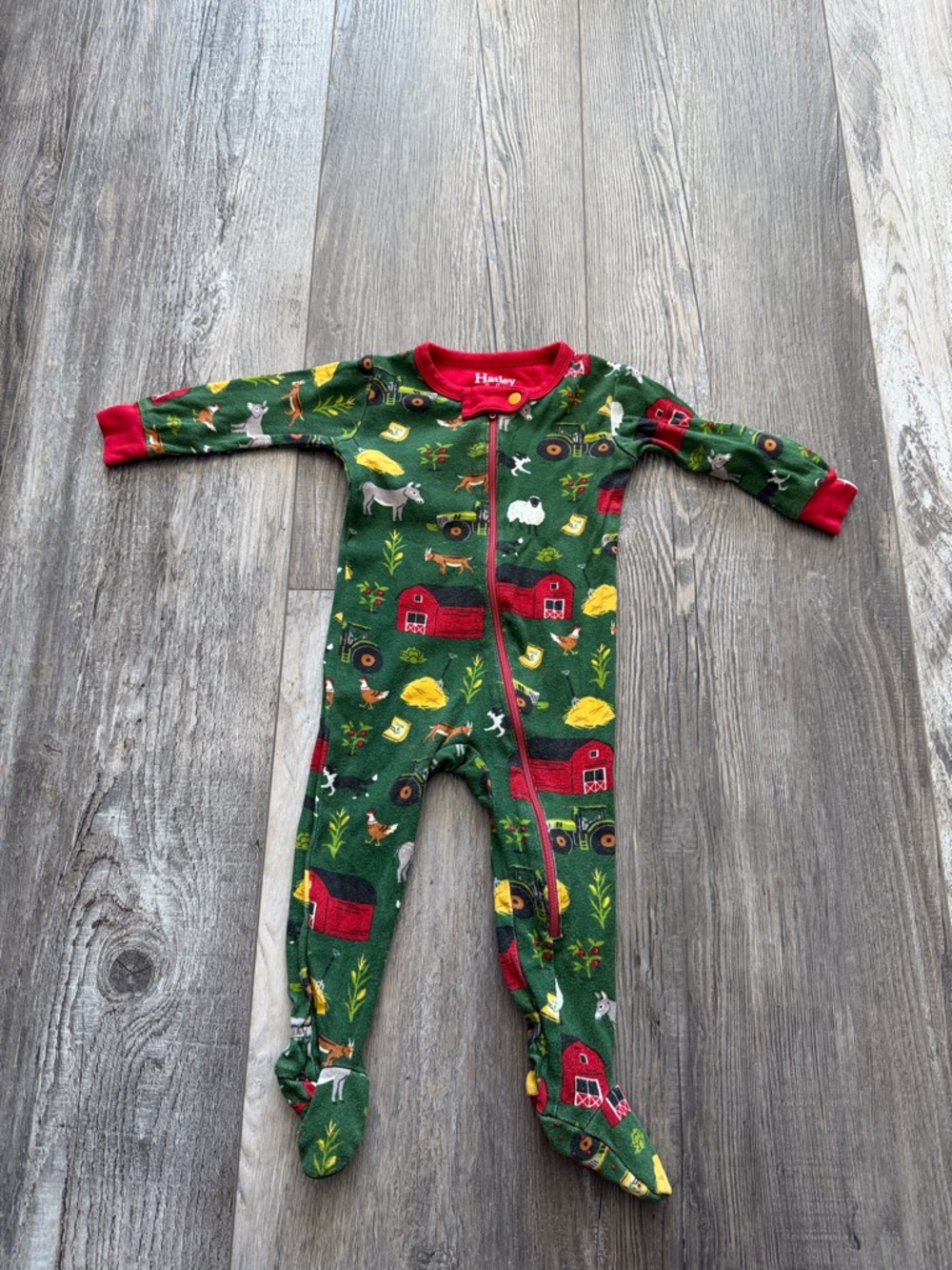 Hatley Green Farm-Print Footed One-Piece with Red Trim